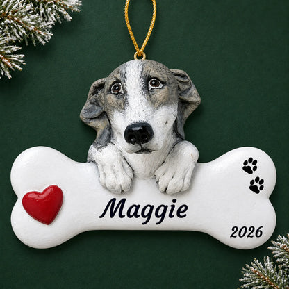 Personalized Greyhound Dog Bone christmas ornament on a dark green pine background