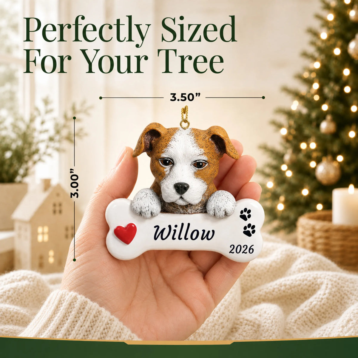 Size guide: the personalized Staffordshire Pit Bull Dog Bone christmas ornament is 3.50 in wide by 3.00 in tall, shown in hand