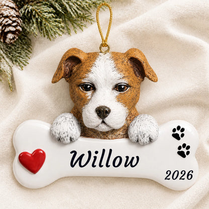 Personalized Staffordshire Pit Bull Dog Bone christmas ornament laid on a soft white knit blanket