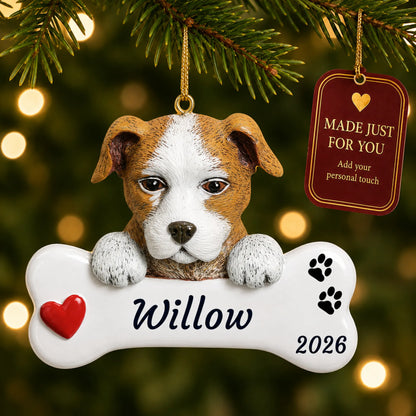 Staffordshire Pit Bull Dog Bone christmas ornament hanging on a lit Christmas tree with a Made Just For You gift tag