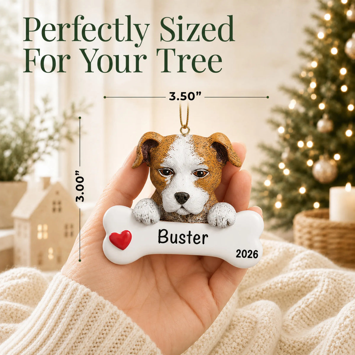Hand holding the personalized Staffordshire pit bull Christmas ornament to show its 3.50 inch width