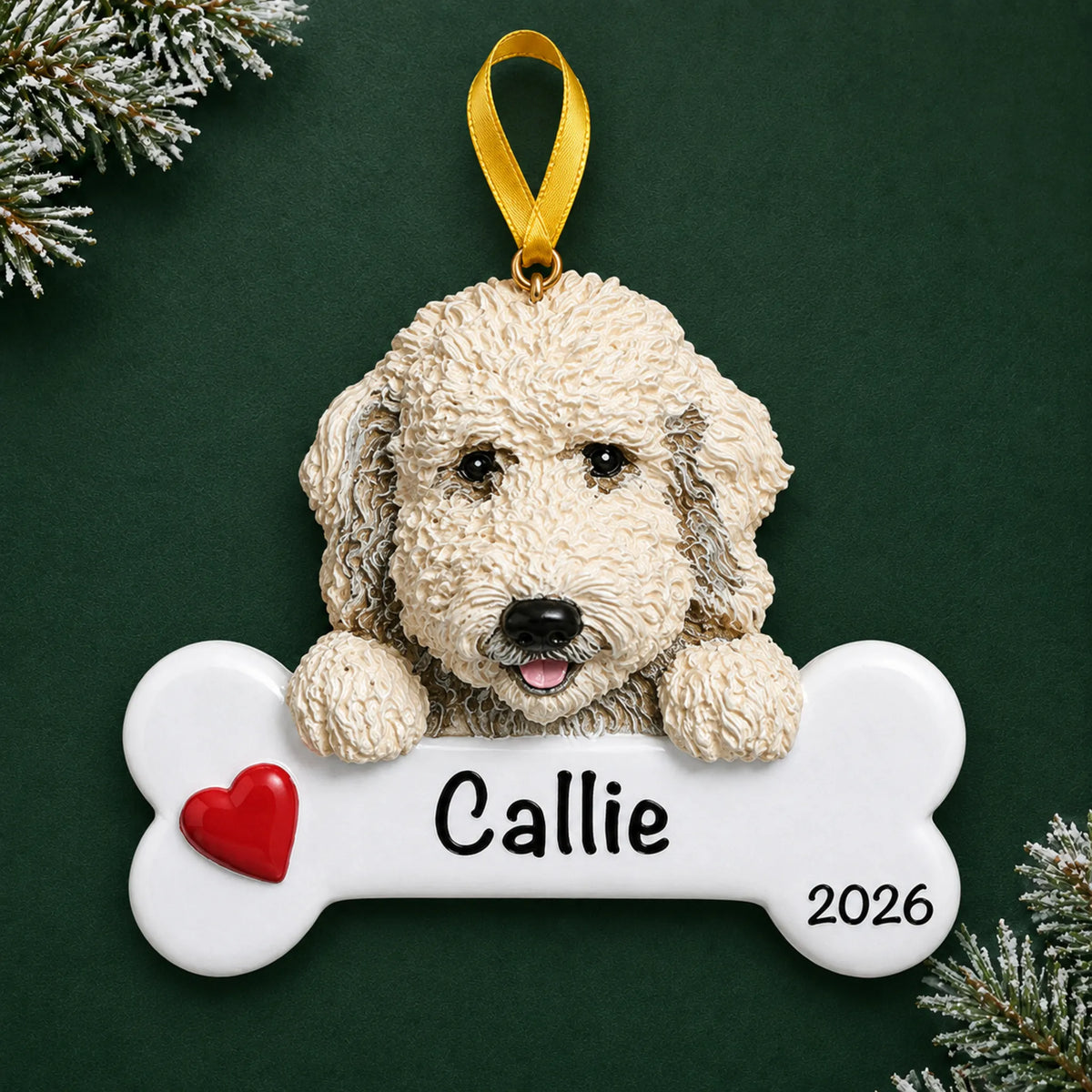 Personalized Labradoodle dog bone Christmas ornament, engraved with a name and year, on a green holiday backdrop