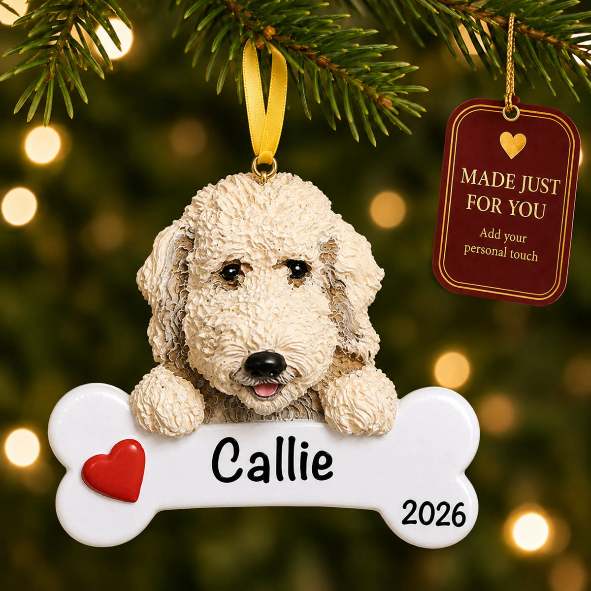Personalized Labradoodle Christmas ornament hanging on a lit tree beside a Made Just For You tag