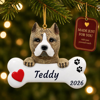 Pit Bull Dog Bone christmas ornament hanging on a lit Christmas tree with a Made Just For You gift tag