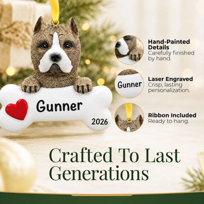 Close-up of the personalized pit bull Christmas ornament showing hand-painted details and laser engraving