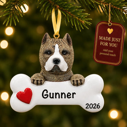 Personalized pit bull Christmas ornament hanging on a lit tree beside a Made Just For You tag