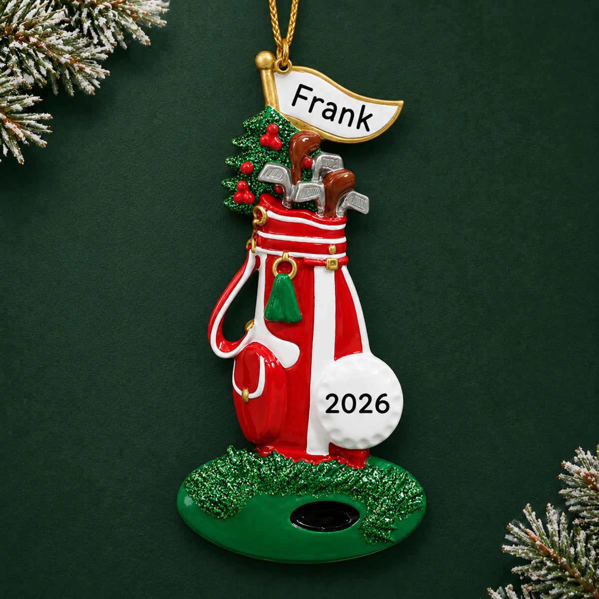 Personalized golf bag christmas ornament on a dark green pine background