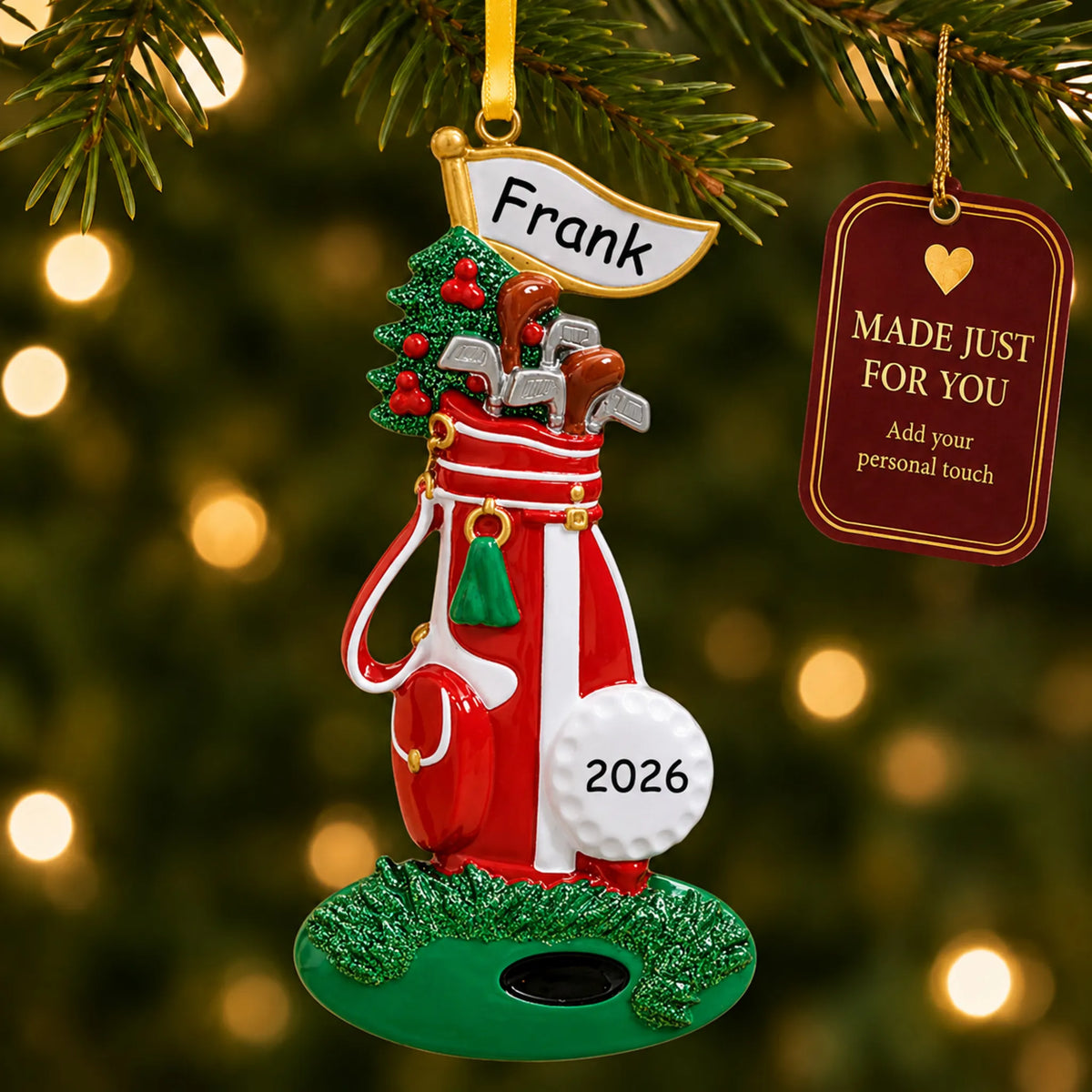 Golf bag christmas ornament hanging on a lit Christmas tree with a Made Just For You gift tag