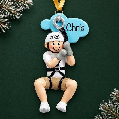 Personalized zip line boy christmas ornament on a dark green pine background