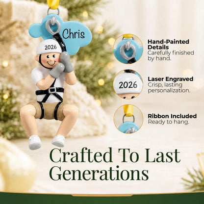 Hand-painted details and laser engraved personalization on the zip line boy christmas ornament, ribbon included