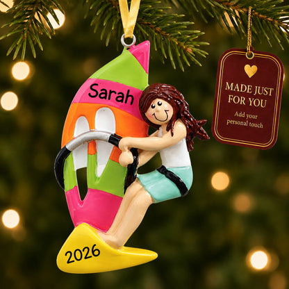 Windsurfing girl christmas ornament hanging on a lit Christmas tree with a Made Just For You gift tag