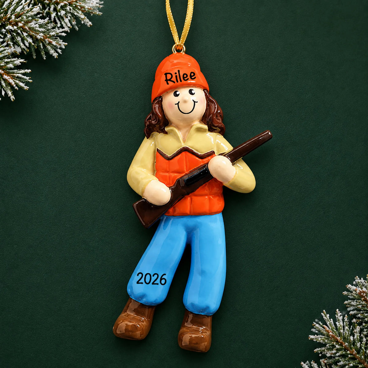 Personalized hunting girl christmas ornament on a dark green pine background