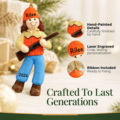 Hand-painted details and laser engraved personalization on the hunting girl christmas ornament, ribbon included