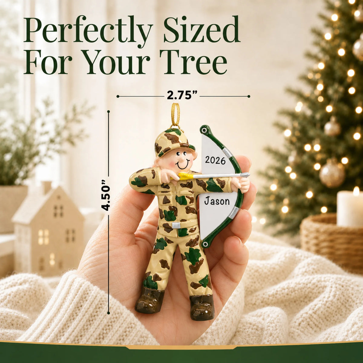 Size guide: the personalized hunter bow & arrow christmas ornament is 2.75 in wide by 4.50 in tall, shown in hand