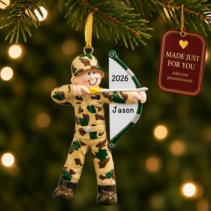 Hunter bow & arrow christmas ornament hanging on a lit Christmas tree with a Made Just For You gift tag
