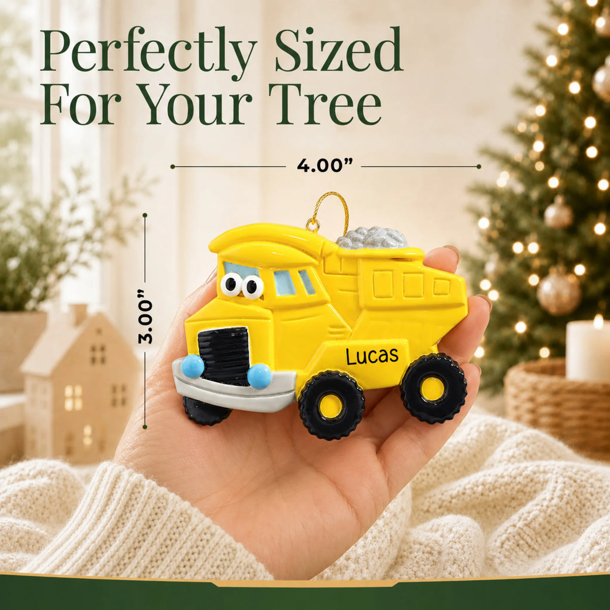 Size guide: the personalized dump truck christmas ornament is 4.00 in wide by 3.00 in tall, shown in hand