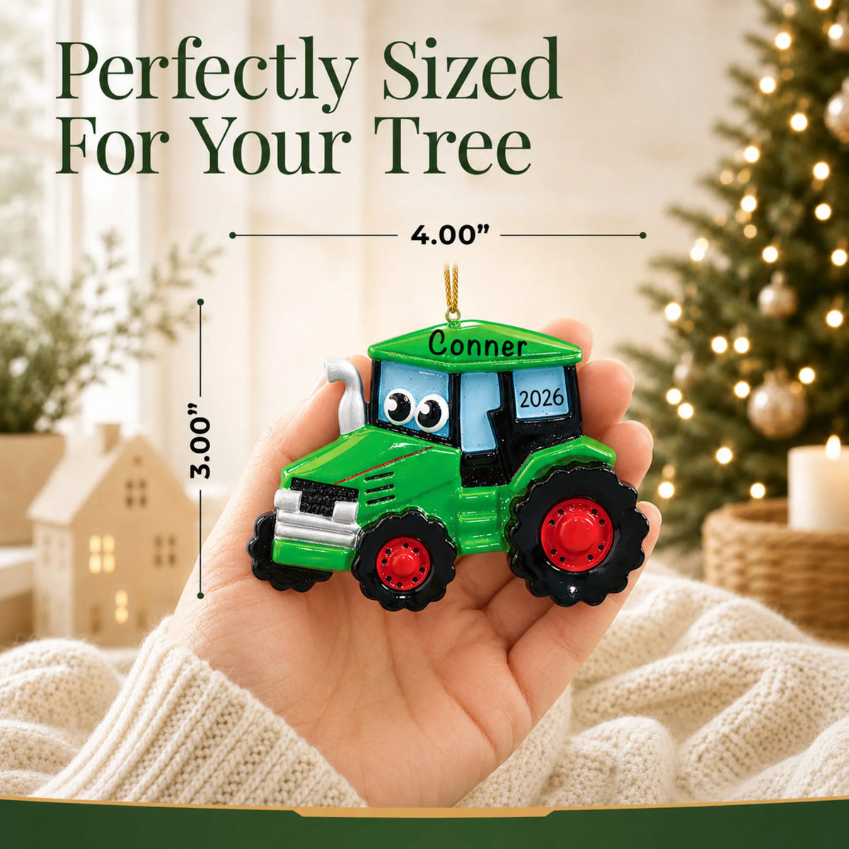Size guide: the personalized green tractor christmas ornament is 4.00 in wide by 3.00 in tall, shown in hand