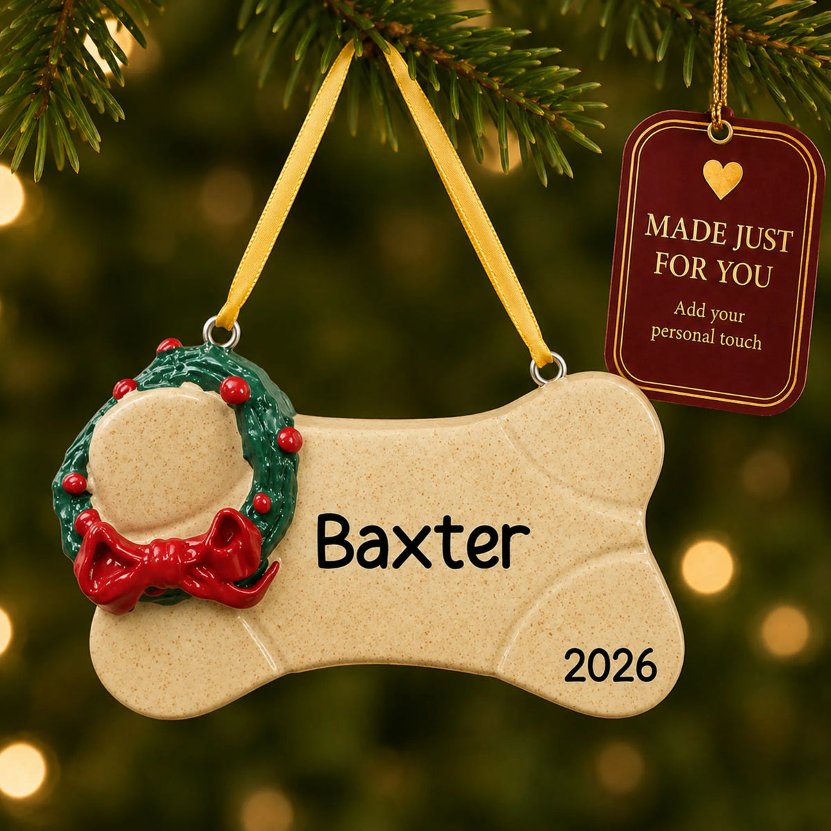 Brown Dog Bone christmas ornament hanging on a lit Christmas tree with a Made Just For You gift tag