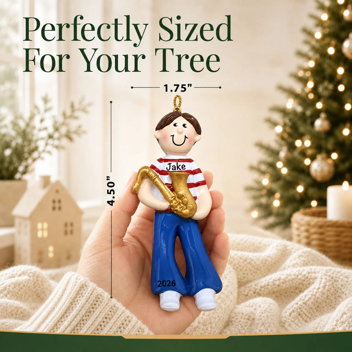 Size guide: the personalized saxophone boy christmas ornament is 1.75 in wide by 4.50 in tall, shown in hand