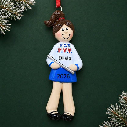 Personalized flute girl christmas ornament on a dark green pine background