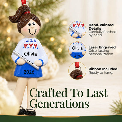 Hand-painted details and laser engraved personalization on the flute girl christmas ornament, ribbon included