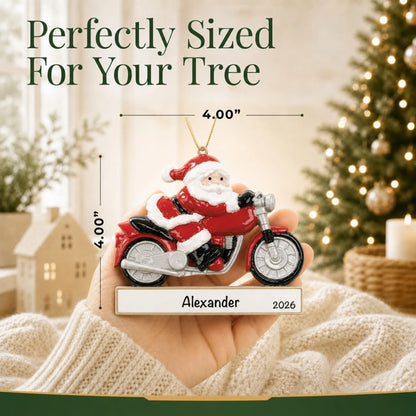 Size guide: the personalized Santa Motorcycle christmas ornament is 4.00 in wide by 4.00 in tall, shown in hand