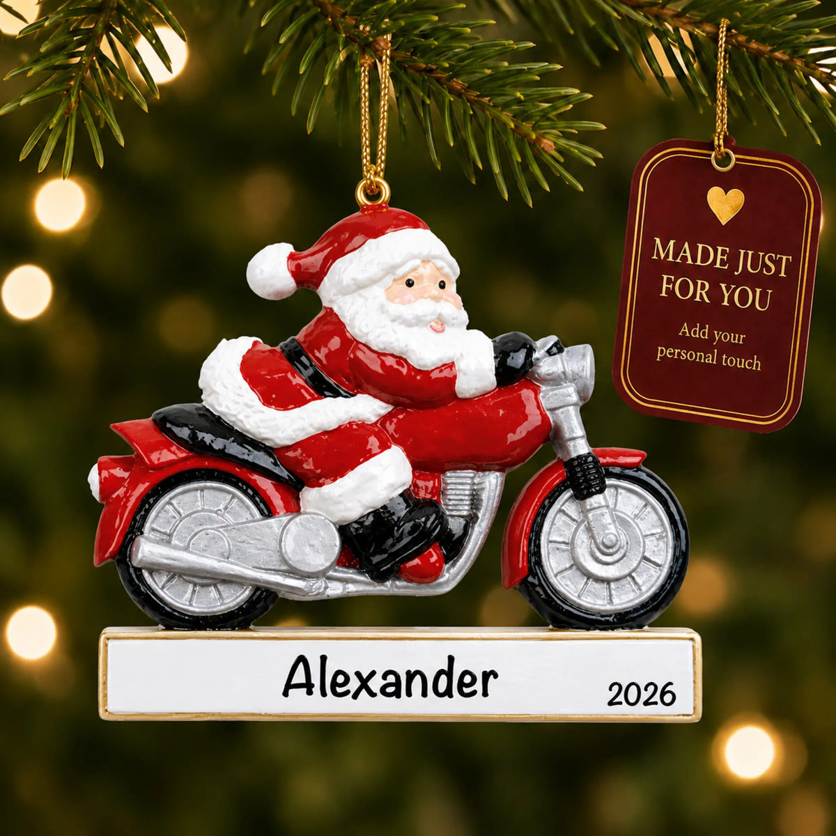 Santa Motorcycle christmas ornament hanging on a lit Christmas tree with a Made Just For You gift tag