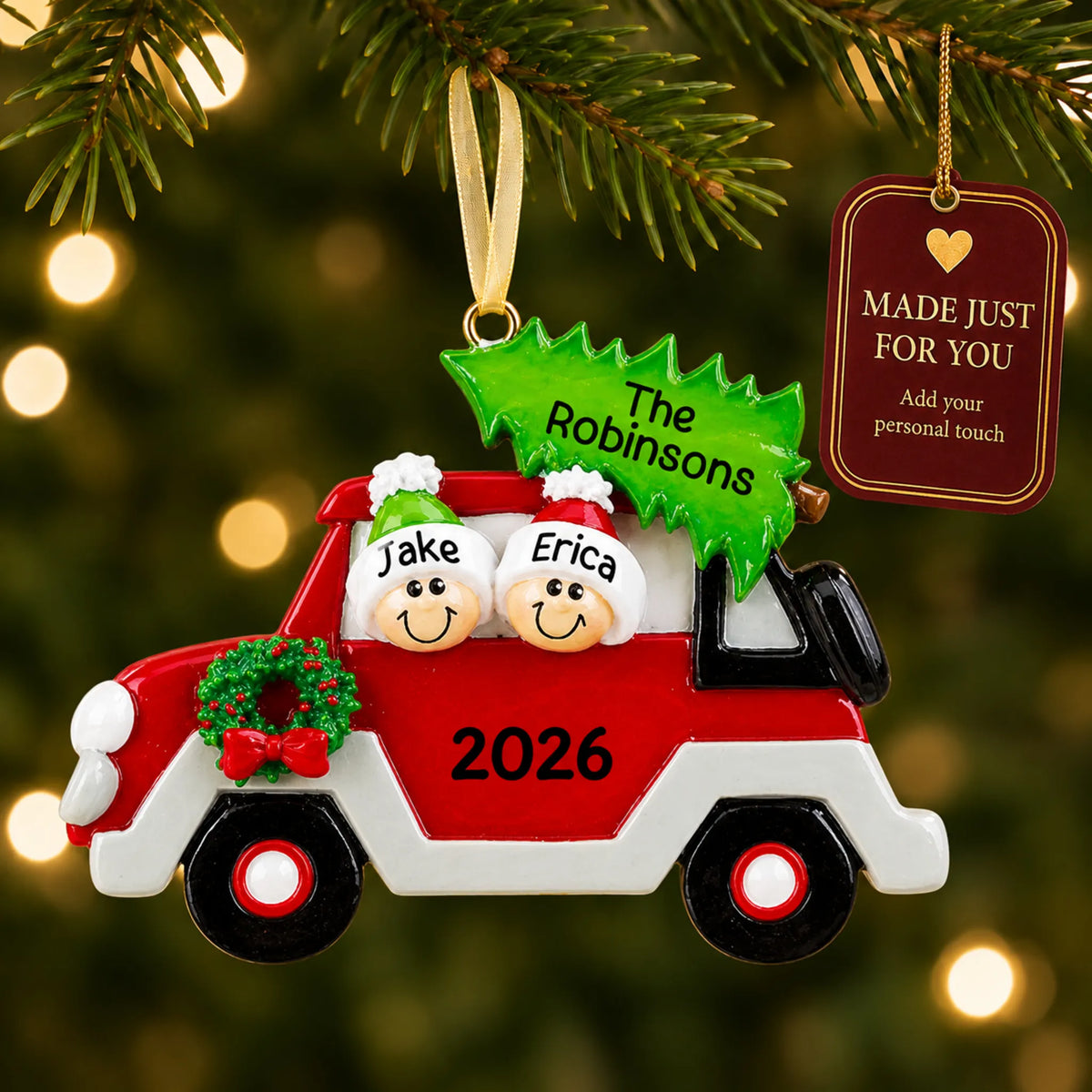 Christmas tree car couple ornament hanging on a lit Christmas tree with a Made Just For You gift tag