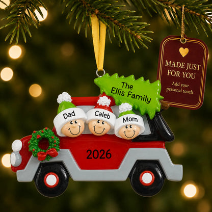 Christmas tree car family of 3 ornament hanging on a lit Christmas tree with a Made Just For You gift tag