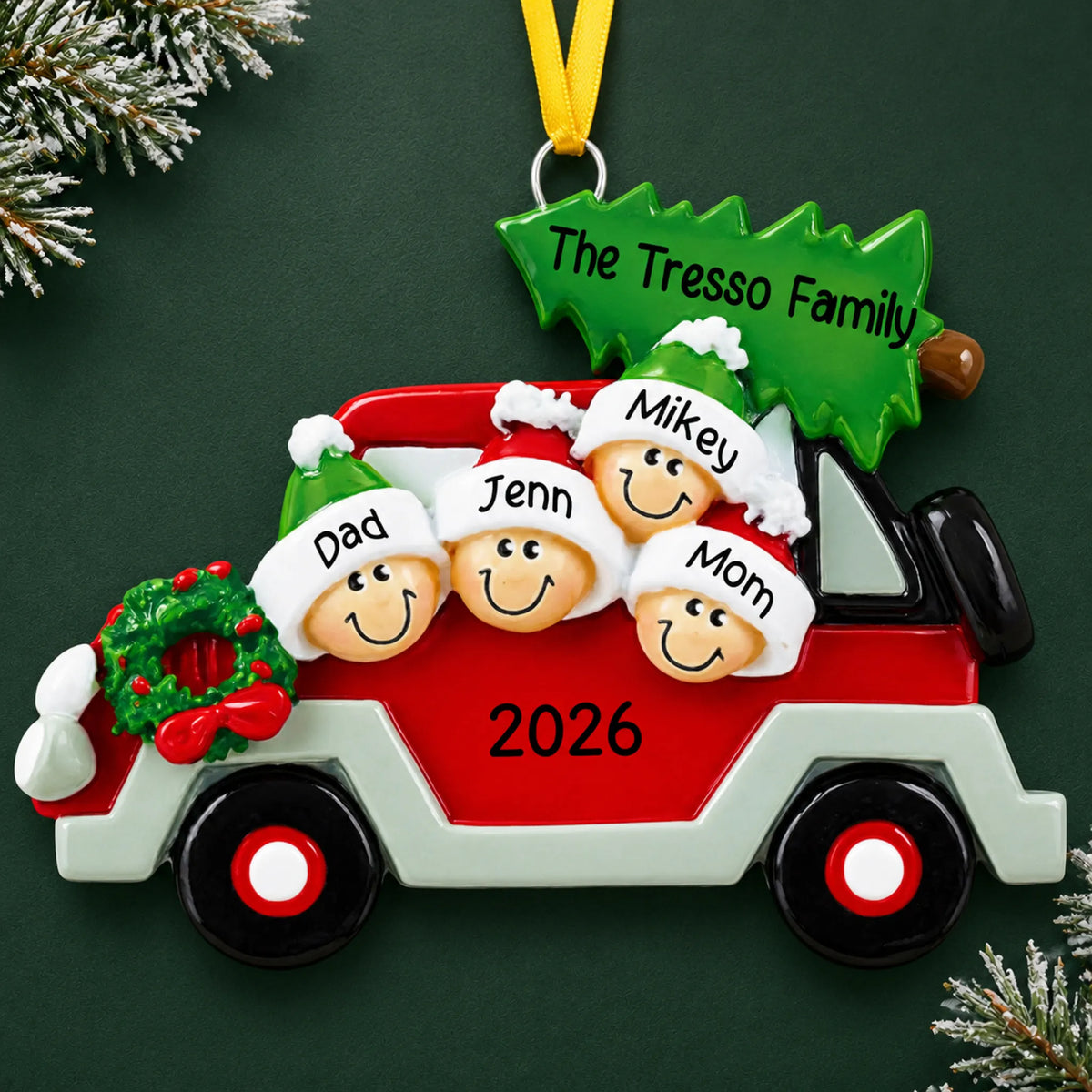 Personalized christmas tree car family of 4 ornament on a dark green pine background