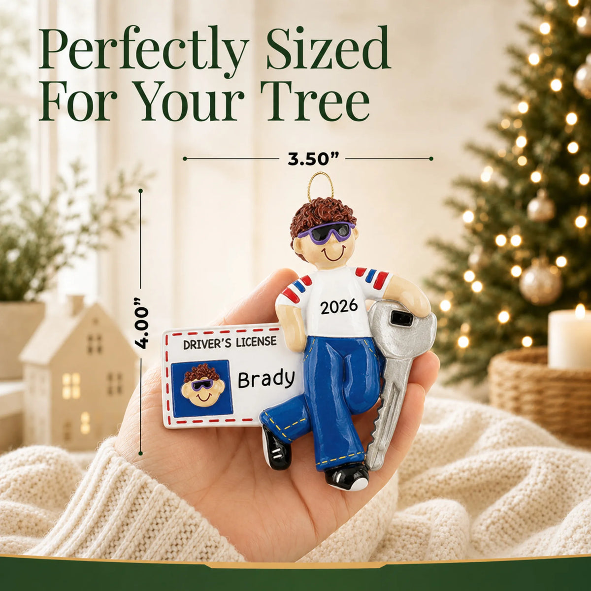 Size guide: the personalized new driver's license brunette boy christmas ornament shown in hand next to a Christmas tree