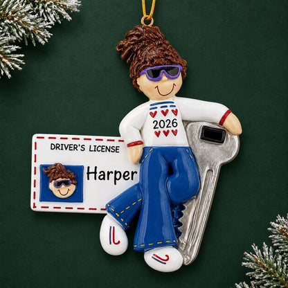 Personalized New Driver Brunette Girl christmas ornament on a dark green pine background