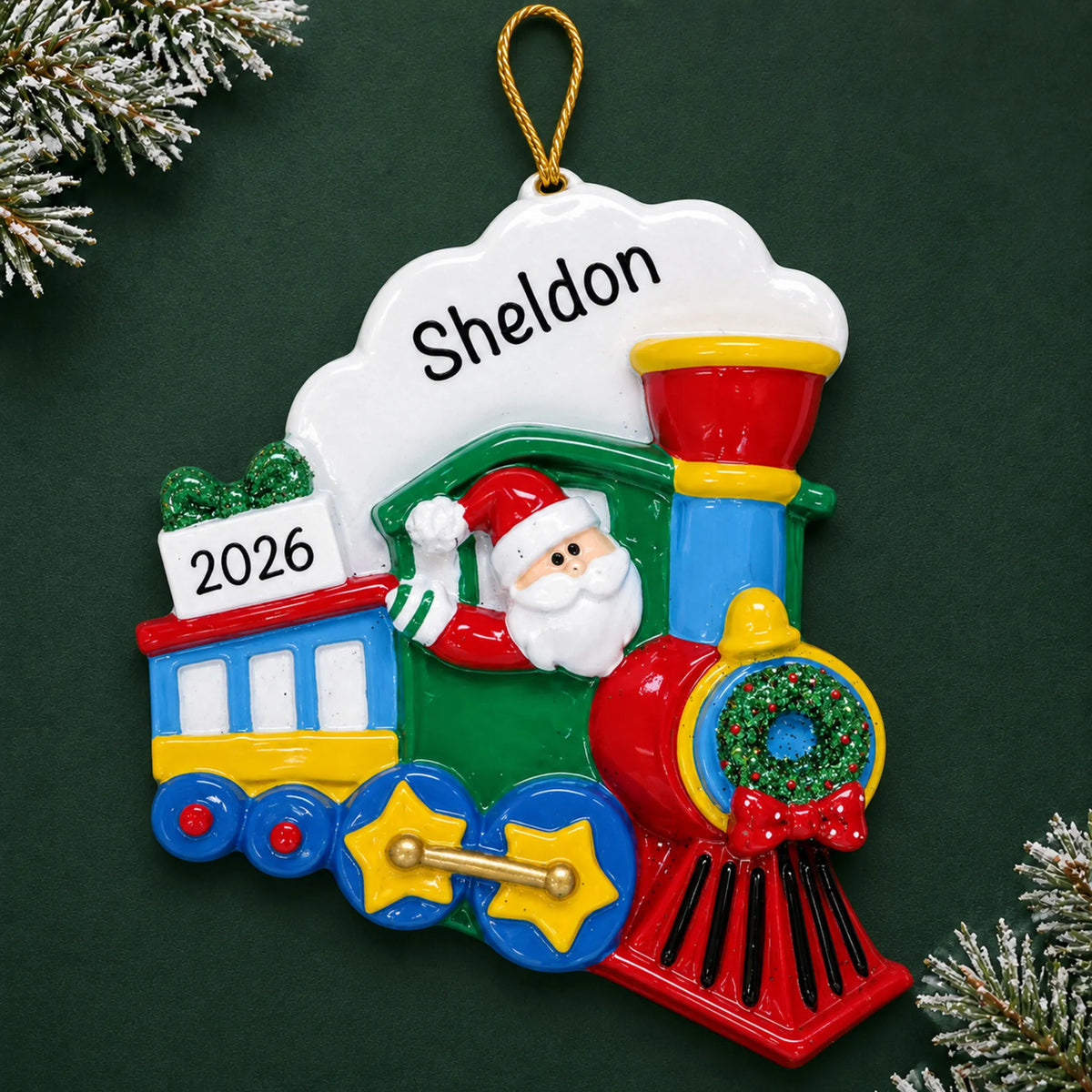 Personalized Santa Train christmas ornament on a dark green pine background
