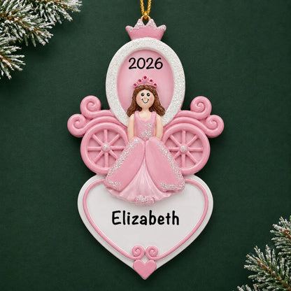Personalized princess carriage christmas ornament on a dark green pine background