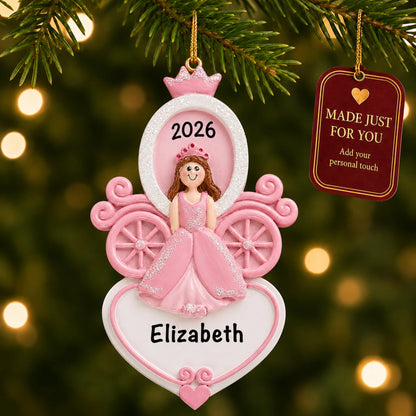 Princess carriage christmas ornament hanging on a lit Christmas tree with a Made Just For You gift tag