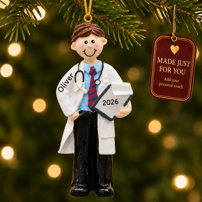 Male doctor christmas ornament hanging on a lit Christmas tree with a Made Just For You gift tag