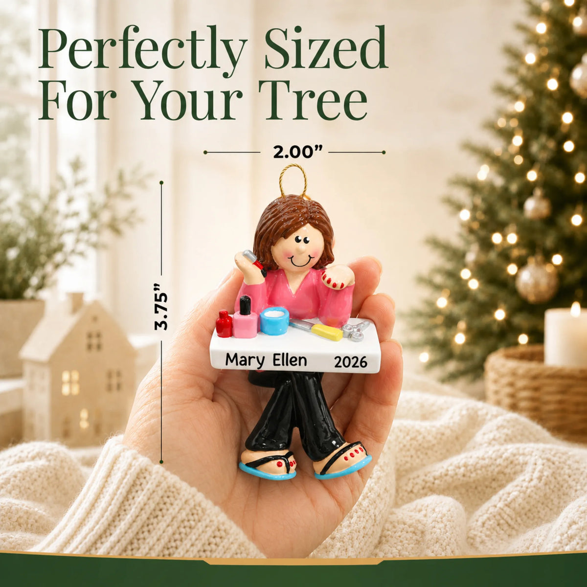 Size guide: the personalized nail tech christmas ornament is 2.00 in wide by 3.75 in tall, shown in hand