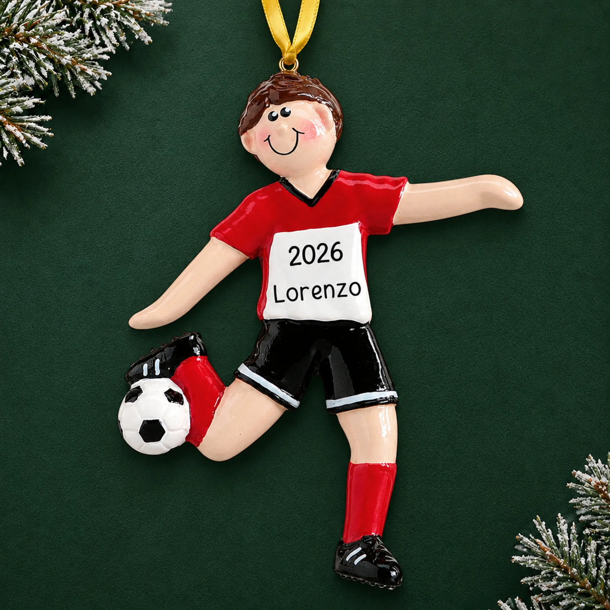Personalized brunette soccer guy christmas ornament on a dark green pine background