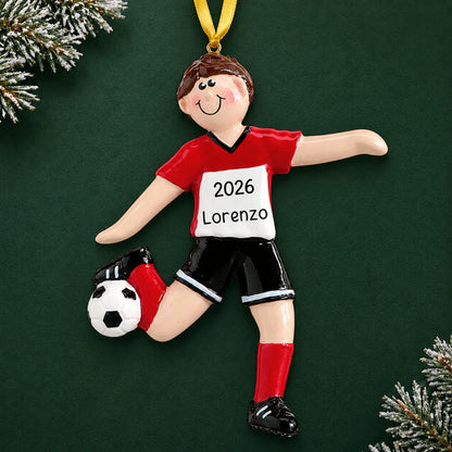 Personalized brunette soccer guy christmas ornament on a dark green pine background