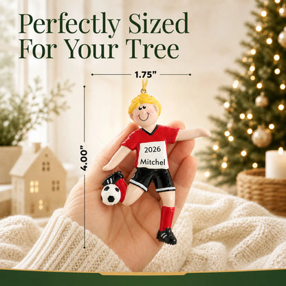 Size guide: the personalized blonde soccer guy christmas ornament is 1.75 in wide by 4.00 in tall, shown in hand