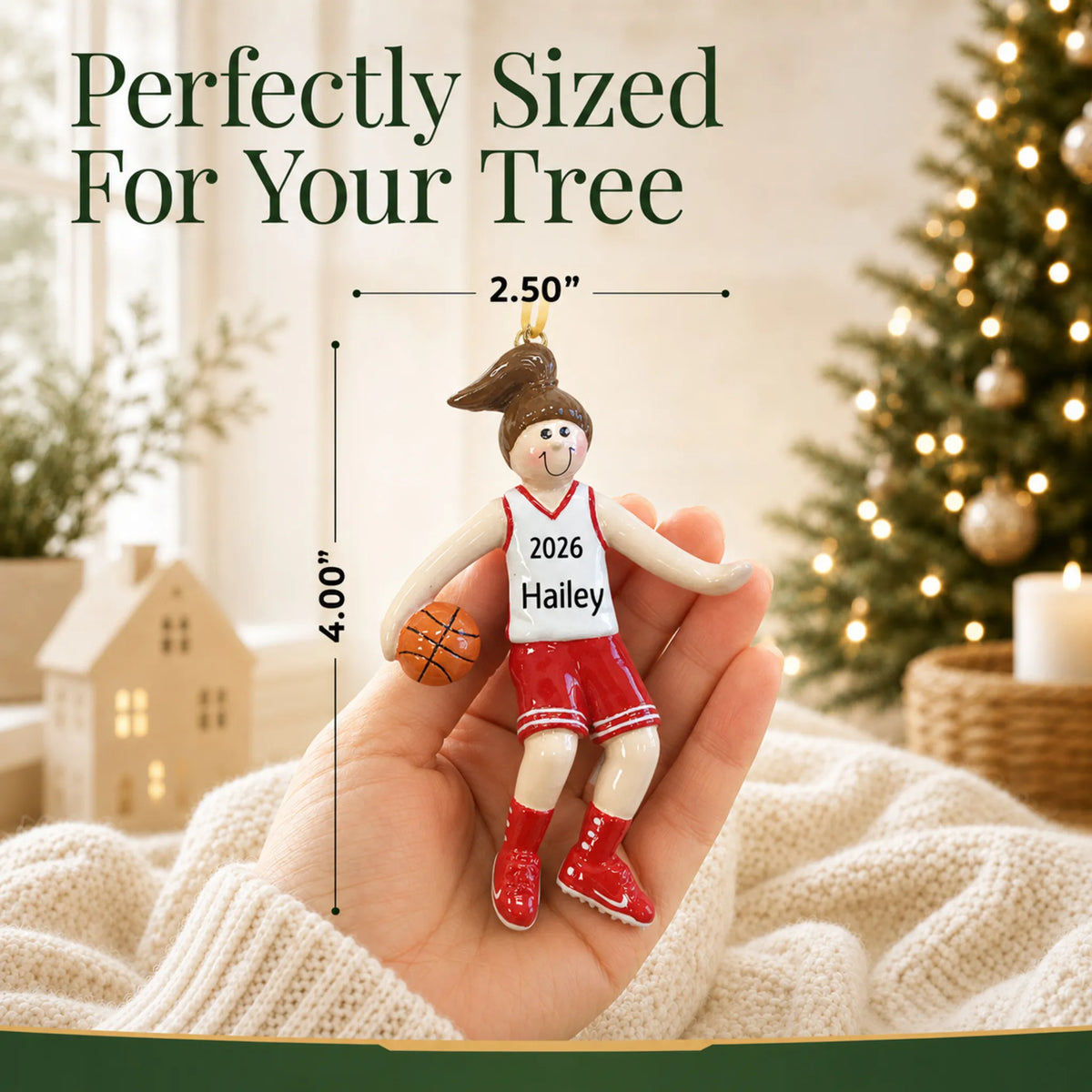 Size guide: the personalized basketball girl christmas ornament is 2.50 in wide by 4.00 in tall, shown in hand
