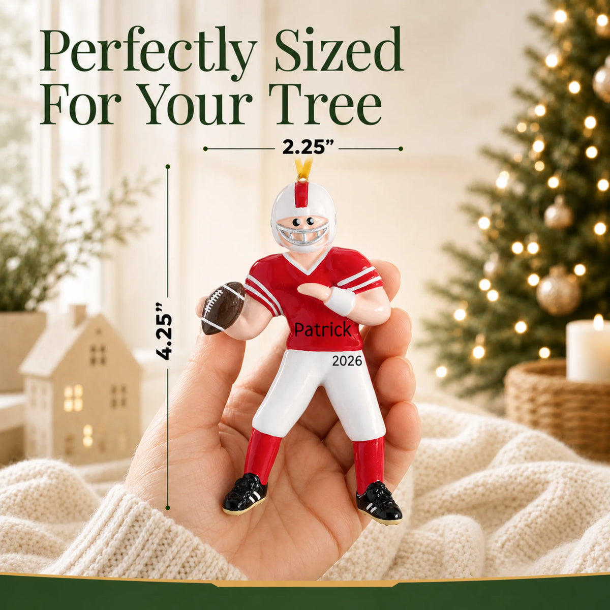 Size guide: the personalized football boy christmas ornament is 2.25 in wide by 4.25 in tall, shown in hand