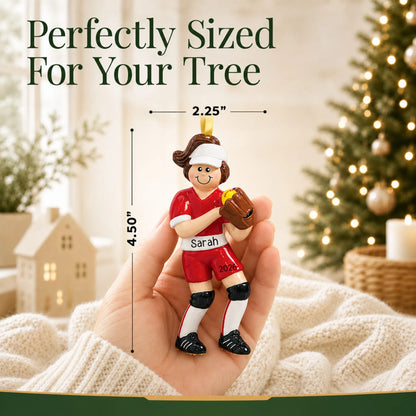Size guide: the personalized softball girl christmas ornament is 2.25 in wide by 4.50 in tall, shown in hand