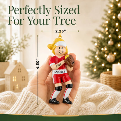Size guide: the personalized blonde softball girl christmas ornament shown in hand next to a Christmas tree