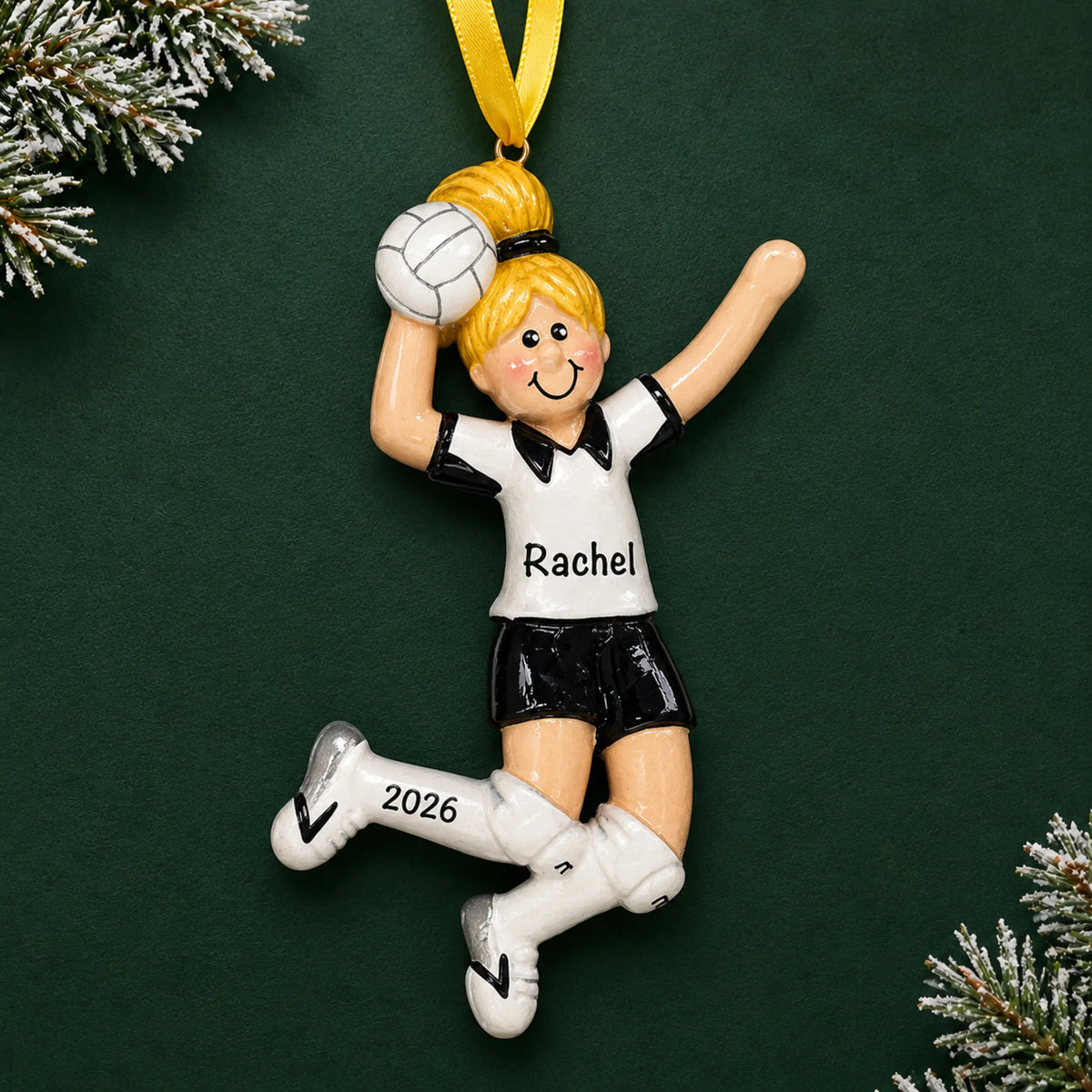 Personalized blonde volleyball girl christmas ornament on a dark green pine background