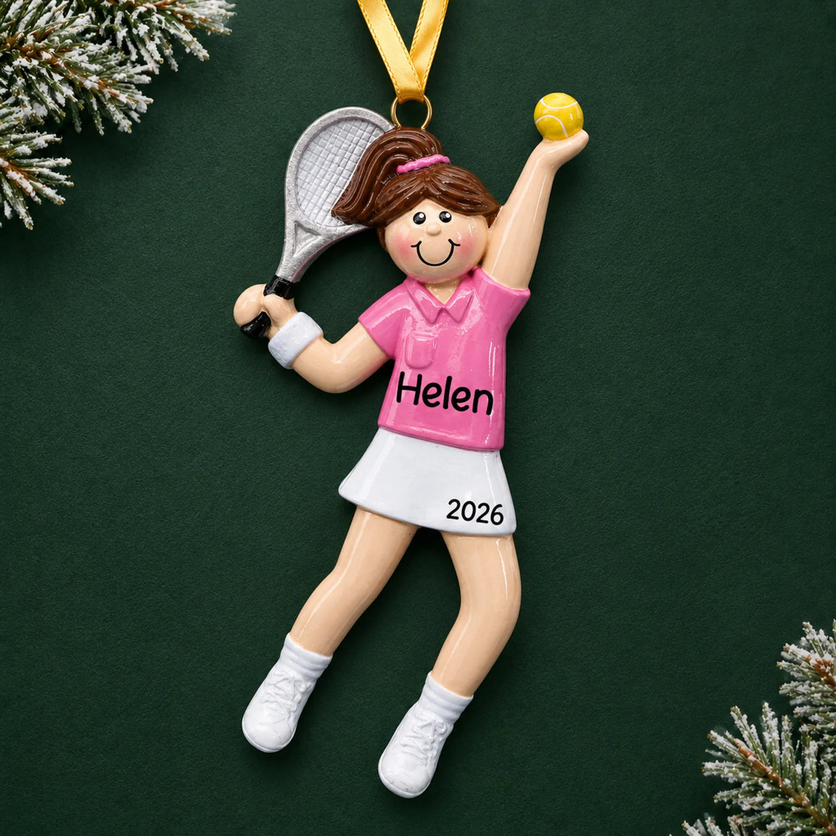 Personalized tennis girl christmas ornament on a dark green pine background