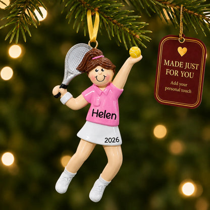 Tennis girl christmas ornament hanging on a lit Christmas tree with a Made Just For You gift tag