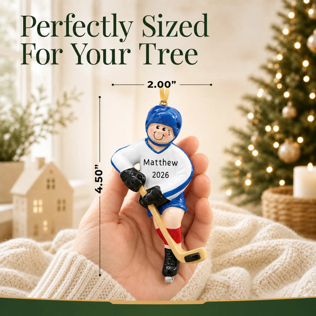 Size guide: the personalized ice hockey boy christmas ornament is 2.00 in wide by 4.50 in tall, shown in hand