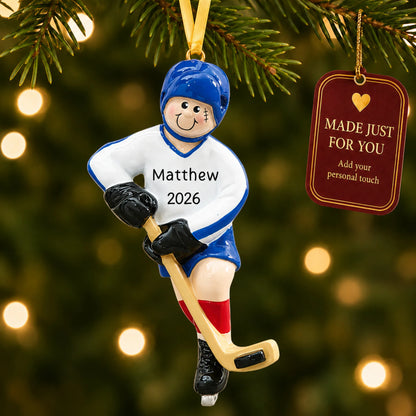 Ice hockey boy christmas ornament hanging on a lit Christmas tree with a Made Just For You gift tag
