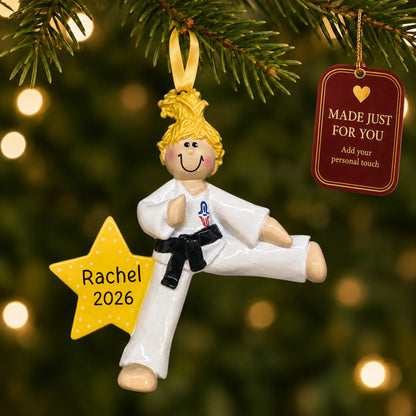 Blonde karate girl christmas ornament hanging on a lit Christmas tree with a Made Just For You gift tag